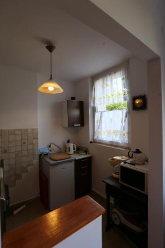 Kuchyň nebo kuchyňský kout v ubytování apartament DaDa