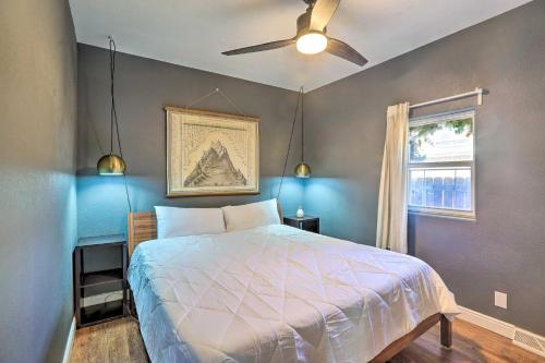 a bedroom with a bed and a ceiling fan at 1/2 Mi to Tennyson: Pet-Friendly Denver Gem in Denver