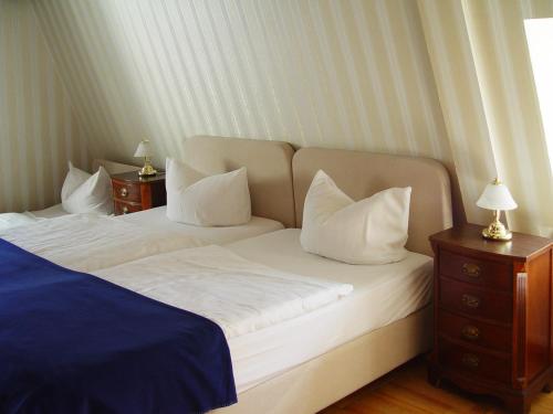 Ένα ή περισσότερα κρεβάτια σε δωμάτιο στο Hotel Altes Hafenhaus