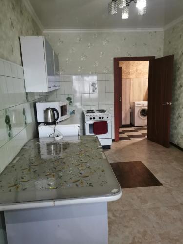 Dapur atau dapur kecil di Apartments on Kommunisticheskiy prospect 125