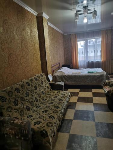 Katil atau katil-katil dalam bilik di Apartments on Kommunisticheskiy prospect 125