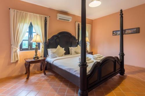 เตียงในห้องที่ Villa Malinee Khao Yai 6 Bedrooms Italian Private Villa