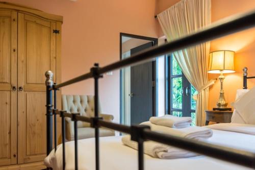 เตียงในห้องที่ Villa Malinee Khao Yai 6 Bedrooms Italian Private Villa