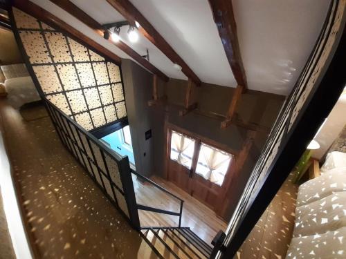 an overhead view of a staircase in a house at Hostal Suite Le Fabrique in Cuenca