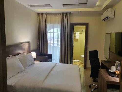 Кровать или кровати в номере Le Masik Hotel