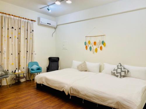 Ein Bett oder Betten in einem Zimmer der Unterkunft 水上雅居民宿