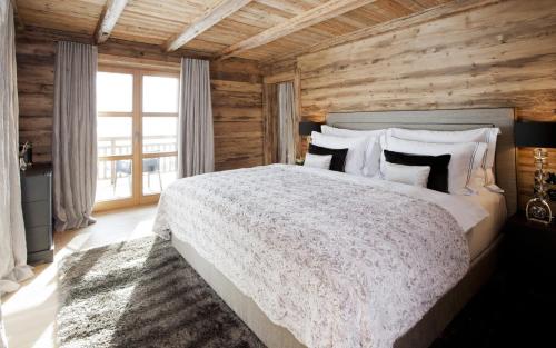 Postelja oz. postelje v sobi nastanitve Wilderer Suiten Mariazell