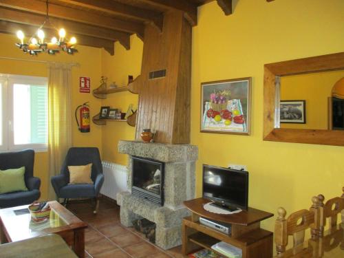 TV a/nebo společenská místnost v ubytování Casa Rural Fuente Tía Canora