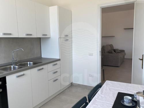 Køkken eller tekøkken på La Torre - Piano terra By Cala Salento