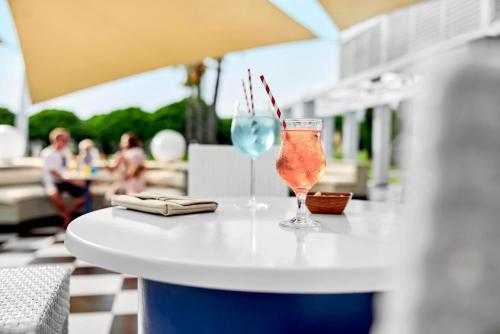 a table with two glasses on top at TUI BLUE Tropical in Dalaman
