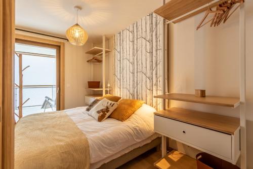 Postel nebo postele na pokoji v ubytování Les ARCS 1600 - SKI AUX PIEDS - MAGNIFIQUE DUPLEX 12 PERSONNES