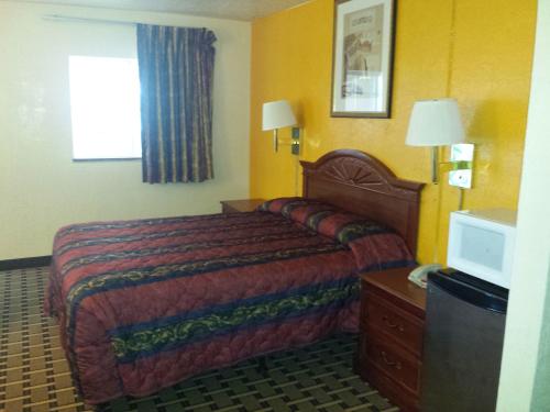 Cama o camas de una habitación en Encore Motel