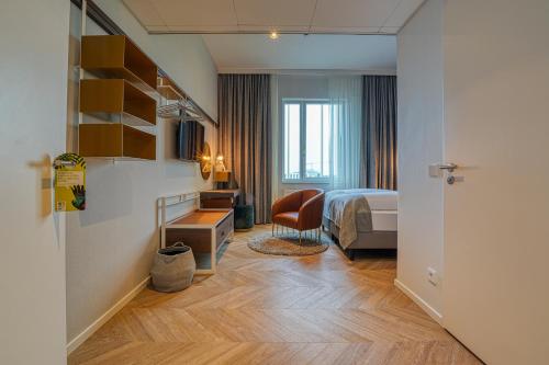 Postel nebo postele na pokoji v ubytování Vienna House Easy by Wyndham Augsburg