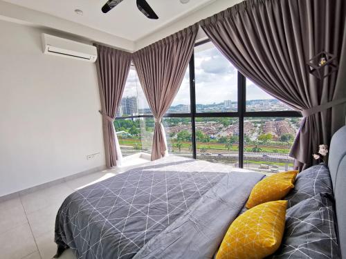 a bedroom with a bed and a large window at Astetica Residences 100mbps Wifi Netflix in Seri Kembangan