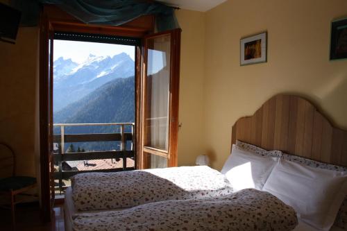 Ένα ή περισσότερα κρεβάτια σε δωμάτιο στο Hotel La Caminatha