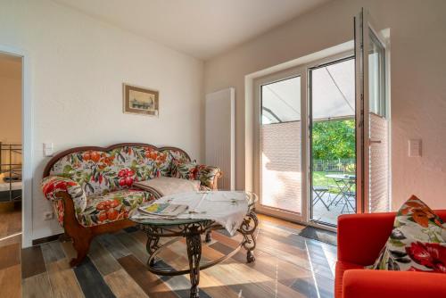Posezení v ubytování Das Rote Haus - Hohnemichels