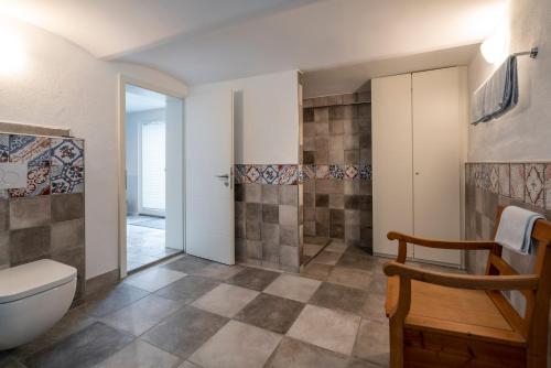 a bathroom with a toilet and a shower at Das Blaue Haus in Boppard