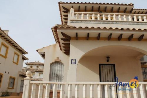 Een balkon of terras bij Playa Golf R4 Lovely quad house with communal pool P245