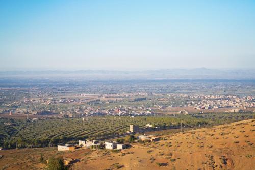 a view of a city from the top of a hill at ourika oufla in Ourika