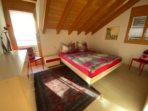 Una cama o camas en una habitación de Alpenparadies