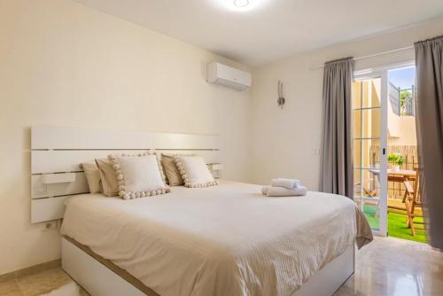 Postel nebo postele na pokoji v ubytování Confortable Apartment Paraiso del Palm Mar