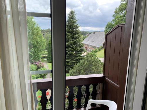 a view from a balcony with a window at Hotel Hochfirst in Lenzkirch