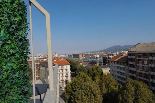 a view of a city from a building at Hotel Lancaster in Turin