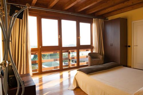 Postel nebo postele na pokoji v ubytování Hotel Fontana Santa
