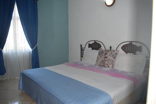 Postel nebo postele na pokoji v ubytování Marmara Kite Appartment
