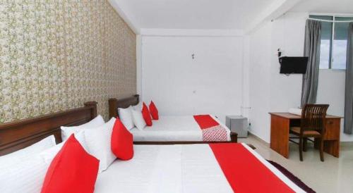 Ein Bett oder Betten in einem Zimmer der Unterkunft KINGS GATE Airport TRANSIT HOTEL