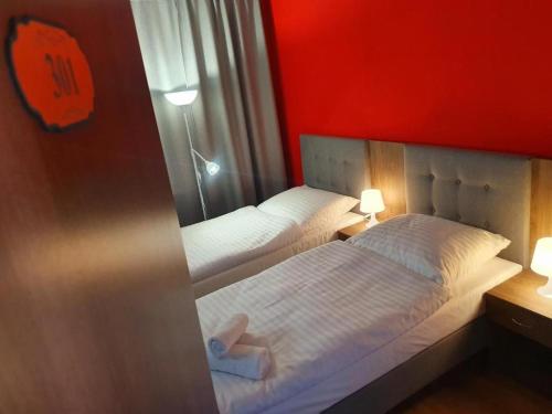 Postel nebo postele na pokoji v ubytování Lux Resort