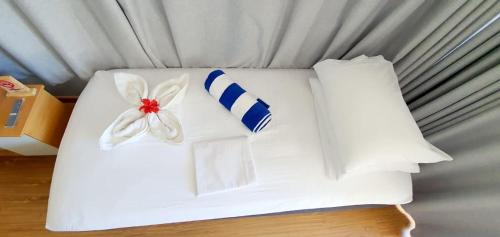 Katil atau katil-katil dalam bilik di Himandhoo Travel & Stays