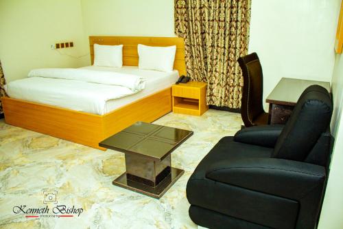 Ένα ή περισσότερα κρεβάτια σε δωμάτιο στο Havilah Towers Hotel Ltd