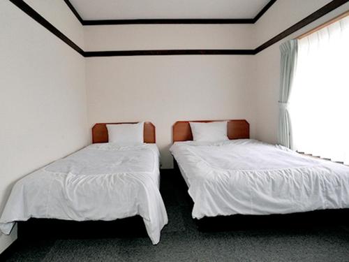 Tempat tidur dalam kamar di Ryokan Seifuso - Vacation STAY 02203v