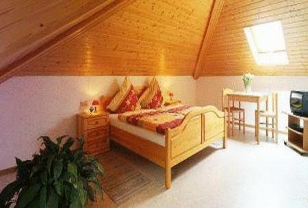 Cama ou camas em um quarto em Gästehaus Sproß