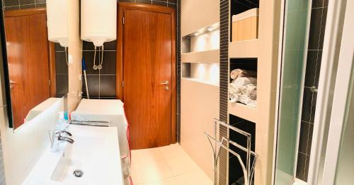 a bathroom with a sink and a mirror at Apartment Marina Senj in Senj