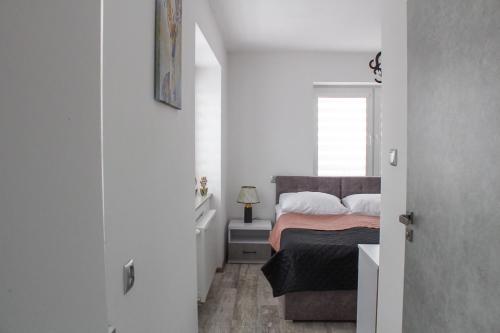 Кровать или кровати в номере Willa Abrakadabra