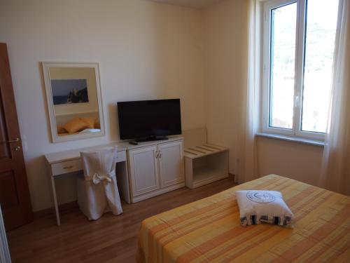 TV a/nebo společenská místnost v ubytování Lido Resort