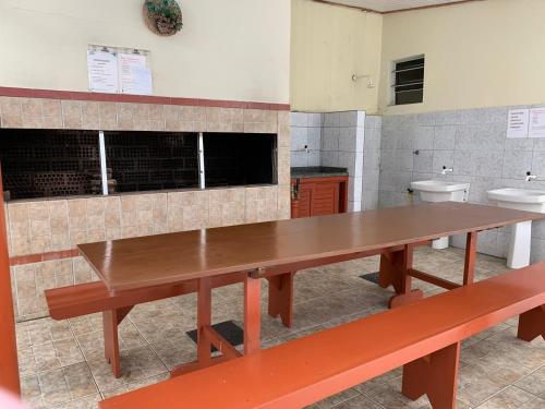 Una cocina o cocineta en Apartamento com ótima localização em Capão da Canoa
