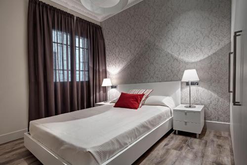 Posteľ alebo postele v izbe v ubytovaní Habitat Apartments Paseo de Gracia