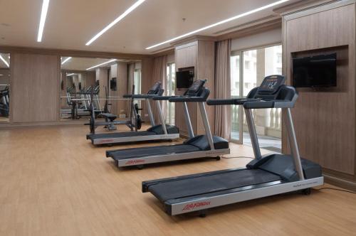 a row of tread machines in a gym at Twin Lakes Hotel in Tagaytay