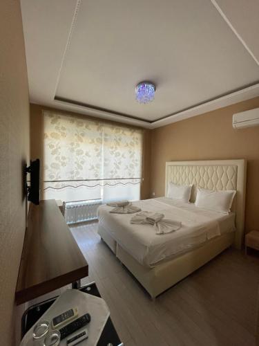 Postel nebo postele na pokoji v ubytování Hotel Dunav