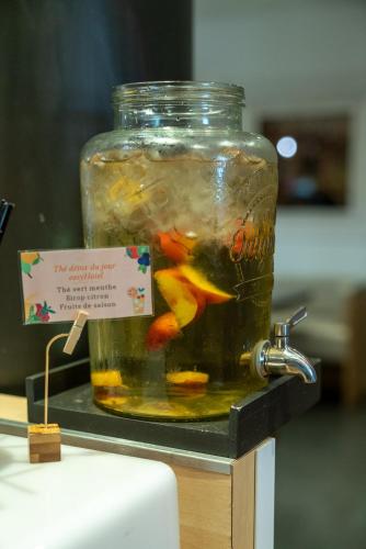 a jar of food on a table with a sign at easyHotel Nice Old Town in Nice
