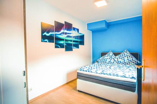 Postel nebo postele na pokoji v ubytování Rheinterrasse Wohnung 1