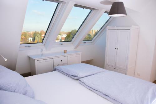 Cama o camas de una habitación en Flair Appartement Alte Donau