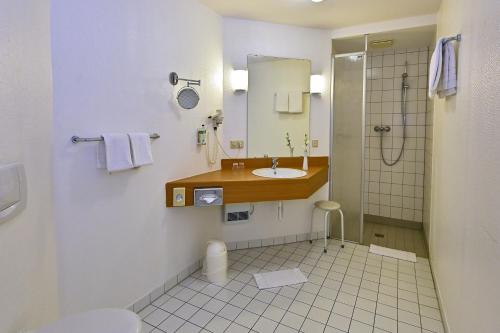 Koupelna v ubytování HESSE HOTEL Celle