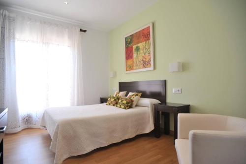 Cama o camas de una habitación en Hotel Rural Hosteria Fontivieja