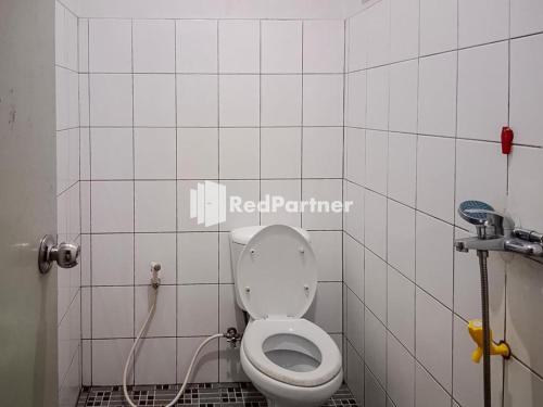 Koupelna v ubytování Kampung Resort Pertiwi RedPartner