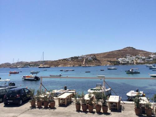 a view of a harbor with boats in the water at Sailinn Mykonos in Ornos