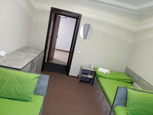 Säng eller sängar i ett rum på Green cost